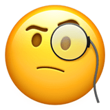 Apple Apple design of the face with monocle emoji verson:ios 16.4