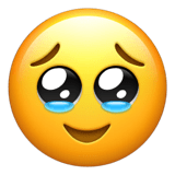 Apple design of the face holding back tears emoji verson:ios 16.4