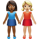 Apple design of the women holding hands: medium-dark skin tone medium-light skin tone emoji verson:ios 16.4