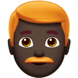 Apple design of the man: dark skin tone red hair emoji verson:ios 16.4