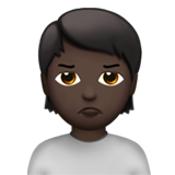 Apple design of the person pouting: dark skin tone emoji verson:ios 16.4