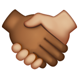 Whatsapp design of the handshake: medium-dark skin tone medium-light skin tone emoji verson:2.23.2.72