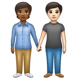 Whatsapp design of the people holding hands: medium-dark skin tone light skin tone emoji verson:2.23.2.72