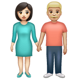 Whatsapp design of the woman and man holding hands: light skin tone medium-light skin tone emoji verson:2.23.2.72