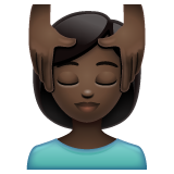 Whatsapp design of the woman getting massage: dark skin tone emoji verson:2.23.2.72