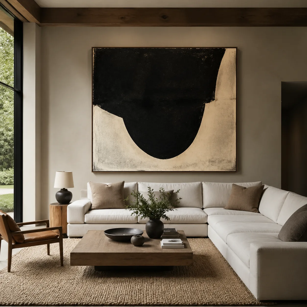 Living room with one large statement artwork on the wall instead of a gallery wall, bold and minimal