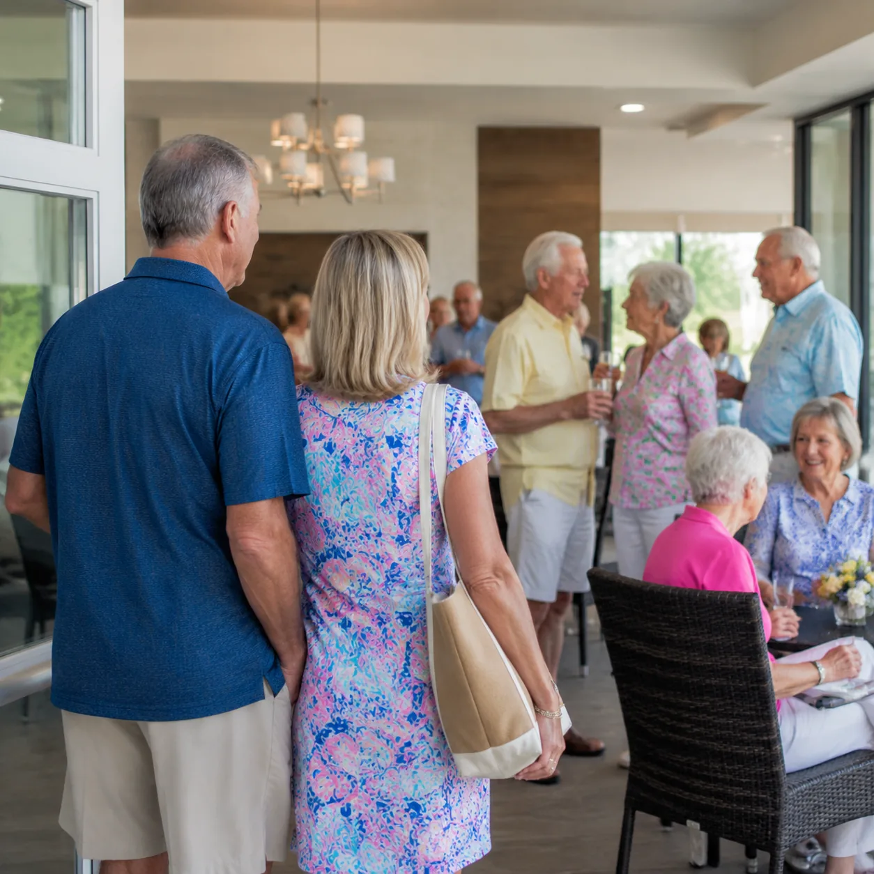 older retirees at Florida community clubhouse event while new couple observes, realistic editorial lifestyle photography